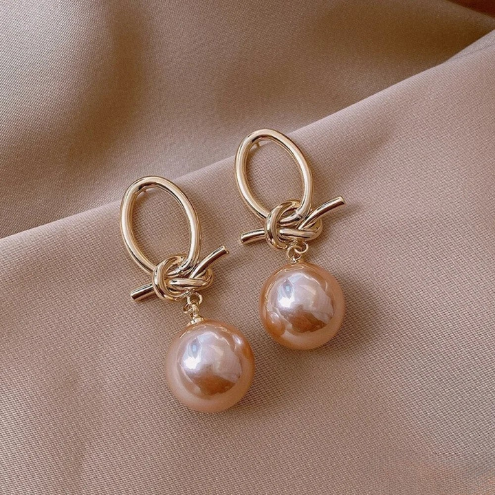 Boucles d'oreilles créoles en perles dorées