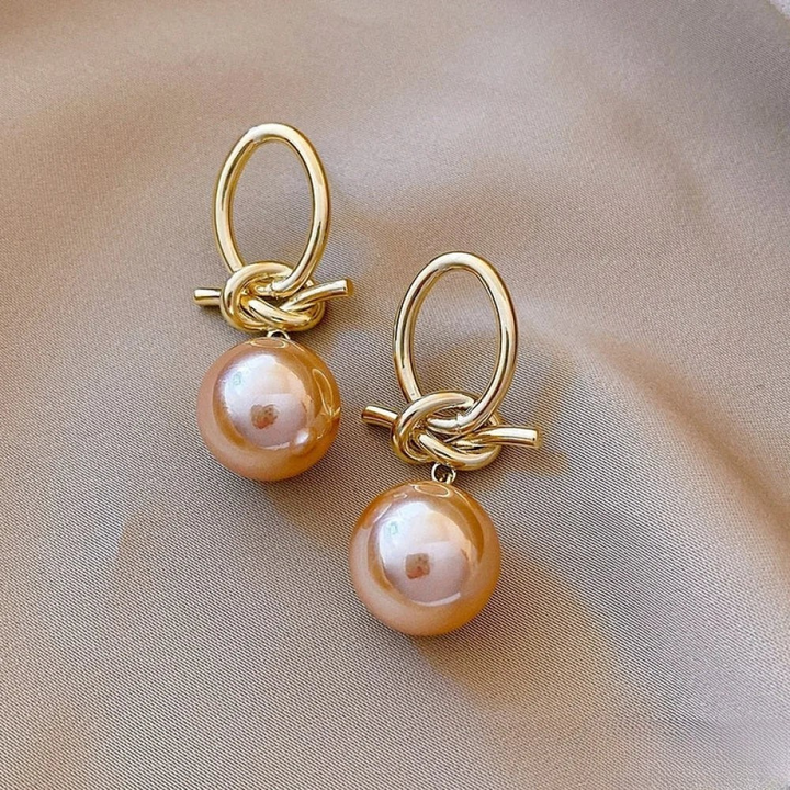 Boucles d'oreilles créoles en perles dorées