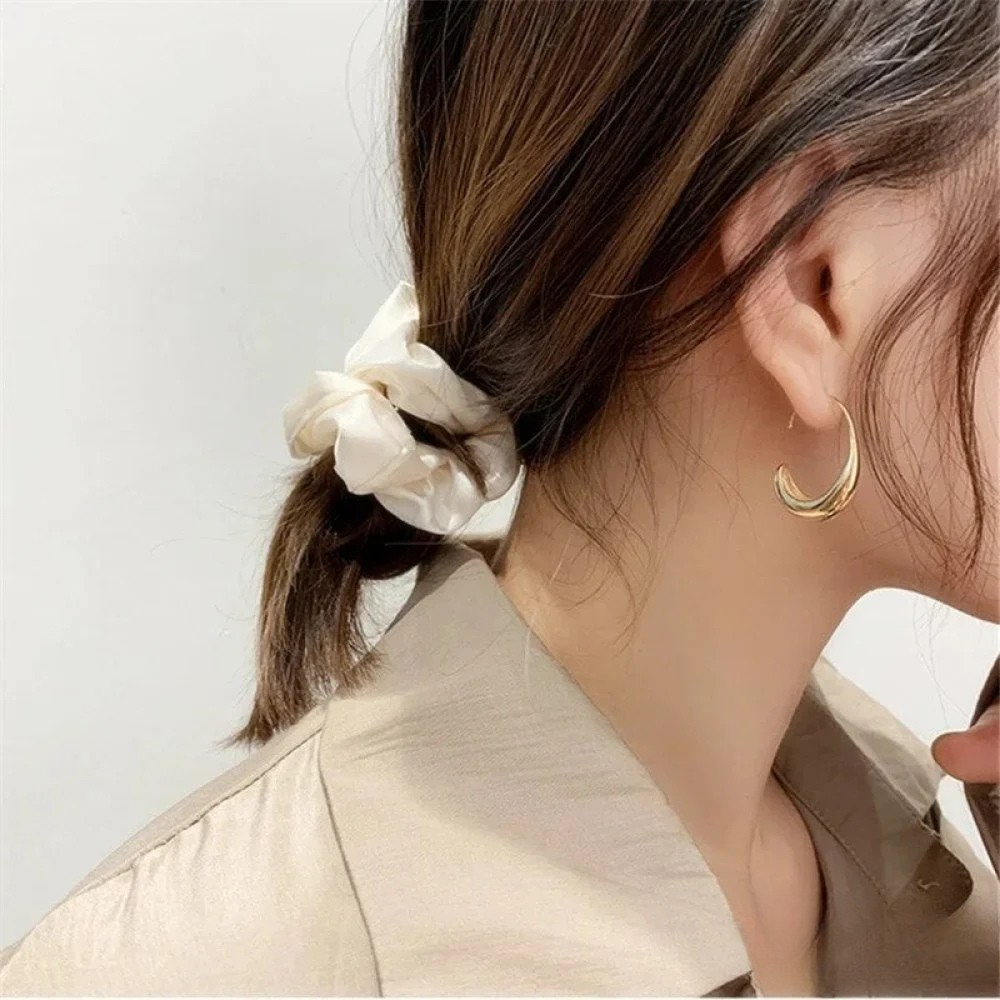 Boucles d'oreilles élégantes en or et argent