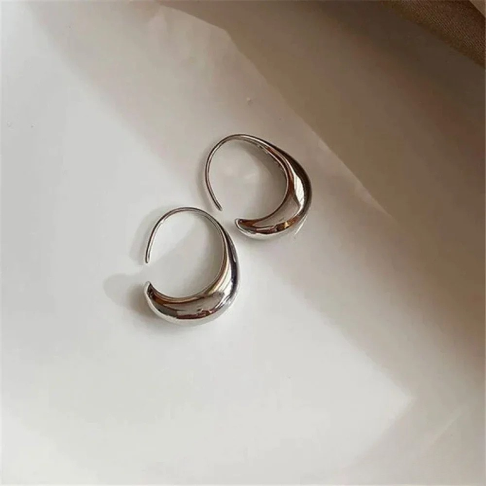 Boucles d'oreilles élégantes en or et argent